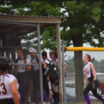 Softball team leaving dugout