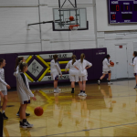 Girls basketball players warming up for the game