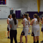 Girls basketball players in greeting line